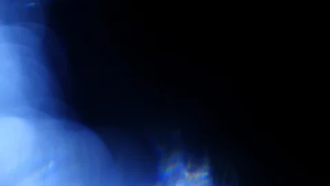 Light leak in 4K quality on dark background with.Real lens flare Stock Footage 86712949