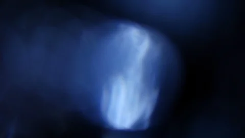 Light leak in 4K quality on dark background with.Real lens flare Stock Footage 86719715