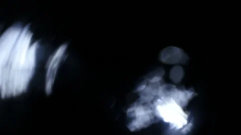 Light leak in 4K quality on dark background with.Real lens flare Stock-Footage 88721968