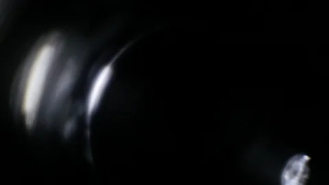 Light leak in 4K quality on dark background with.Real lens flare Stock Footage 88722946