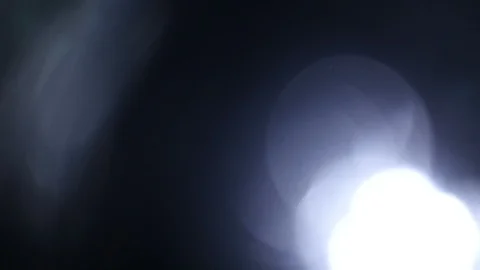 Light leak in 4K quality on dark background with.Real lens flare Stock Footage 88722968