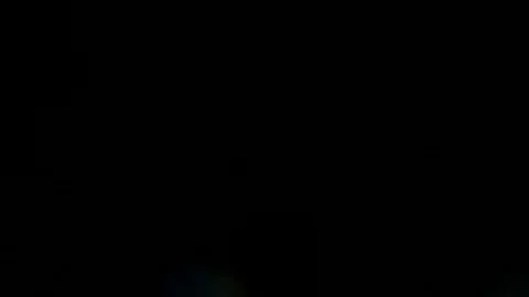Light leak in 4K quality on dark background with.Real lens flare Stock Footage 88725562