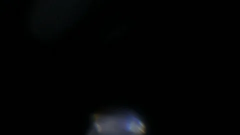 Light leak in 4K quality on dark background with.Real lens flare Stock Footage 88725800