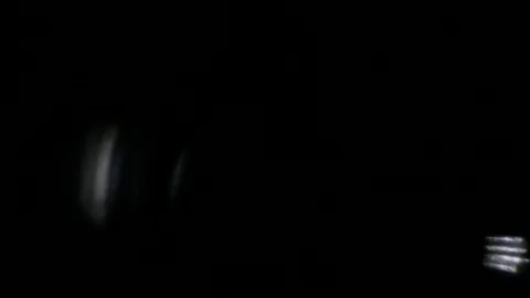 Light leak in 4K quality on dark background with.Real lens flare Stock Footage 88726134