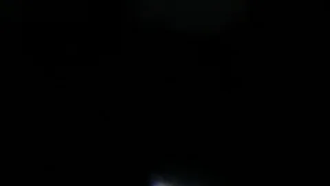 Light leak in 4K quality on dark background with.Real lens flare Stock Footage 88728102