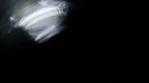 Light leak in 4K quality on dark background with.Real lens flare Stock Footage 88732607
