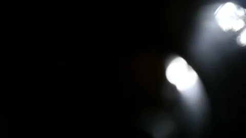 Light leak in 4K quality on dark background with.Real lens flare Stock Footage 88735567
