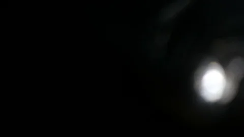 Light leak in 4K quality on dark background with.Real lens flare Stock Footage 88736764