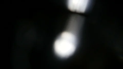 Light leak in 4K quality on dark background with.Real lens flare Stock Footage 88737495