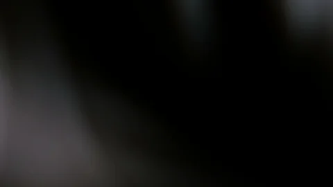 Light leak in 4K quality on dark background with.Real lens flare Stock Footage 88739022