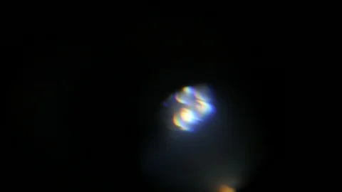 Light leak in 4K quality on dark background with.Real lens flare Stockbeeldmateriaal 88741449