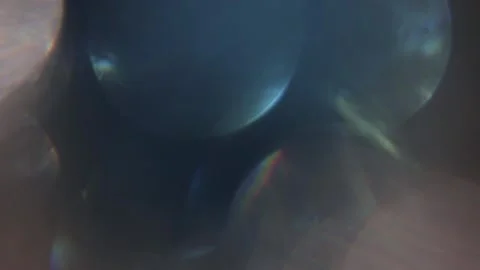 Light leak in the background as abstract blue white prism bokeh Stock Footage 318823920