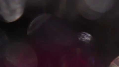 Light leak in the background in the form of a blue bokeh, a red prism Stockbeeldmateriaal 318822623