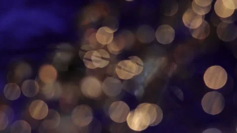 Light leak in blue video background as golden bokeh 库存影片 317536583