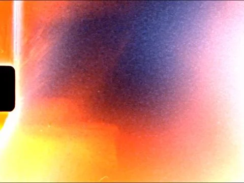 Light leak creating colorful gradient on film frame edge Stock Photos