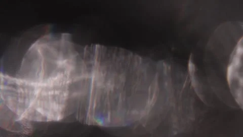 Light leaks in the background in the form of large prismatic bokeh Vídeo Stock 318824464