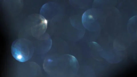 Light leaks with blue bokeh Vídeo Stock 319392938