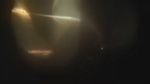 Light leaks effect background animation. Lens light leaks flashing around making Stock Footage 233744541
