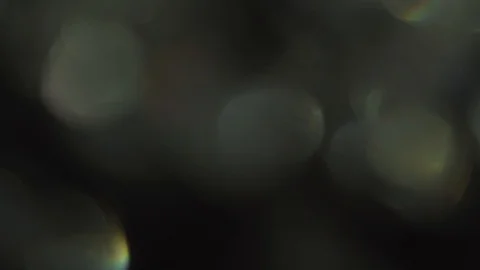 Light leaks, iridescent foil reflections. Can be used as creative background. Video stock 100089064
