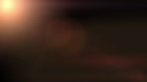 Light Leaks. Overlay. Amber Light Leaks on Black Background. Glare of light on Stock Footage 165507069