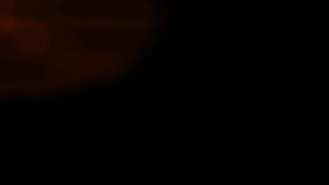 Light leaks overlay. Amber light leaks on a black background. Glare overlays for Stock Footage 244795415