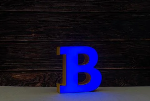 The light letter B is part of an advertising sign. Stock Photos