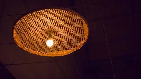 The light from the light bulb, the light of warmth, the light with bamboo. Stock Photos