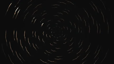 Light lines form swirling patterns in dark background Stock Footage 339358779