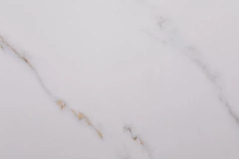 Light marble surface with subtle patterns and textures adding elegance to any Stock Photos