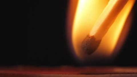 Light a match in the dark. Strike a matchstick Stock Footage 196353460