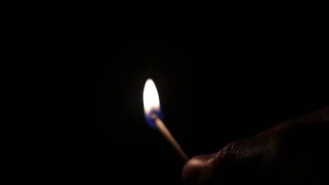 Light from matches in full darkness Stock Footage 156856084