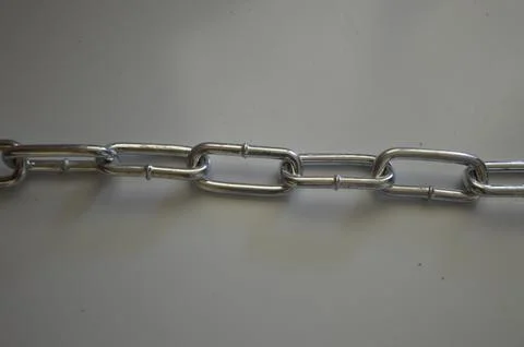 Light metal chain on a different background Stock Photos