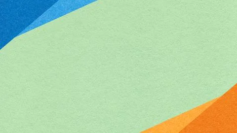Light mint green paper texture background with blue orange geometric corner.. Stock Photos