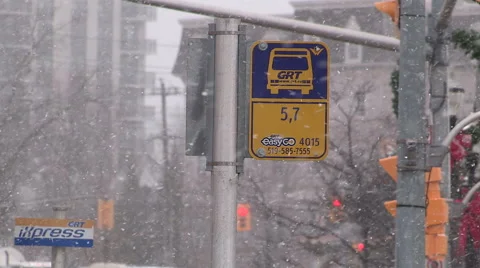 Light to moderate pretty snow and windy in the the city on cold winter day. Stock Footage 45172566