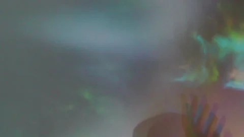 Light in Motion: Hands Weaving Shadows &amp; Color Stock Footage 302944383