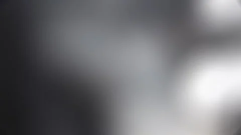 Light Motion under a matte background White color Stockbeeldmateriaal 320356020