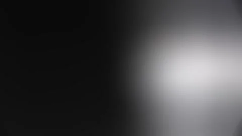 Light Motion under a matte background White color Vídeo Stock 320357900
