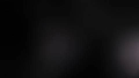 Light Motion under a matte background  動画素材 320358314