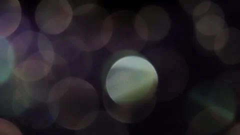 Light movement of dark and bright sparkling bokeh Видео 318665082