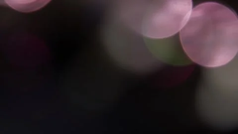 Light movement on sparkling bokeh in the dark Video stock 319377339