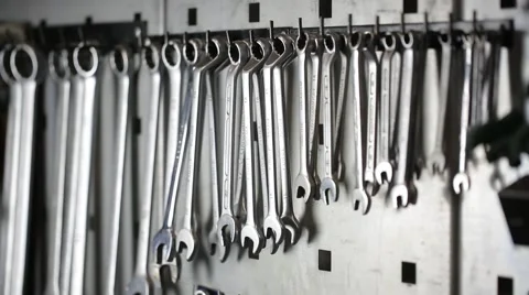 Light moves and leaves a shadow on wrenches 스톡 동영상 59596305