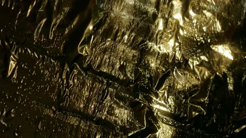 Light moves on a golden surface time-lapse. Stock Footage 233179374