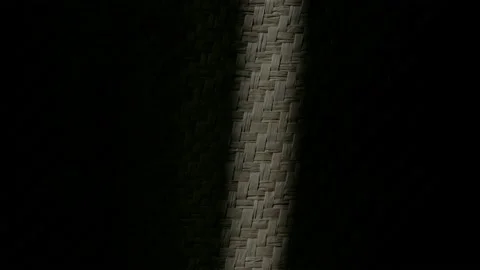 Light moves over a fragment of a wicker basket. Stock Footage 150176847