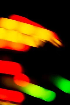 Light neon abstract on black background blurry effect... Light neon abstract  Photos