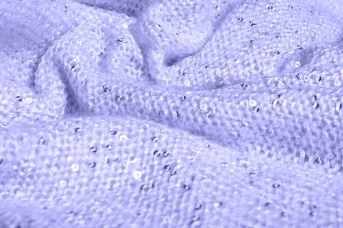Light nude violet soft, fluffy, light blanket with shiny sequins Stock Photos