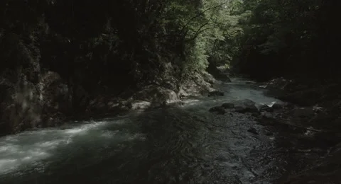 Light up one side river, 4k non color graded (4000x2160) Stock Footage 50129883