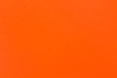 Light orange paper texture useful as a background Stock Photos