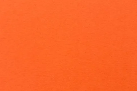 Light orange paper wall texture background. Stock Photos