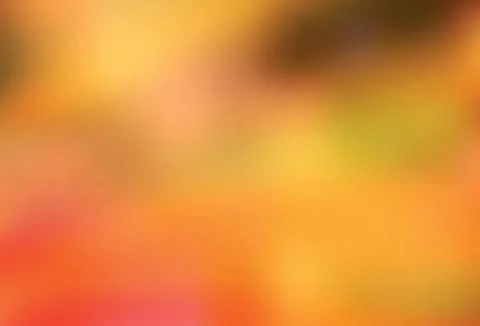 Light Orange vector colorful blur background. Stock Illustration