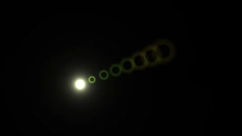 Light orbs move in sequence against a dark background Stock Footage 338242237